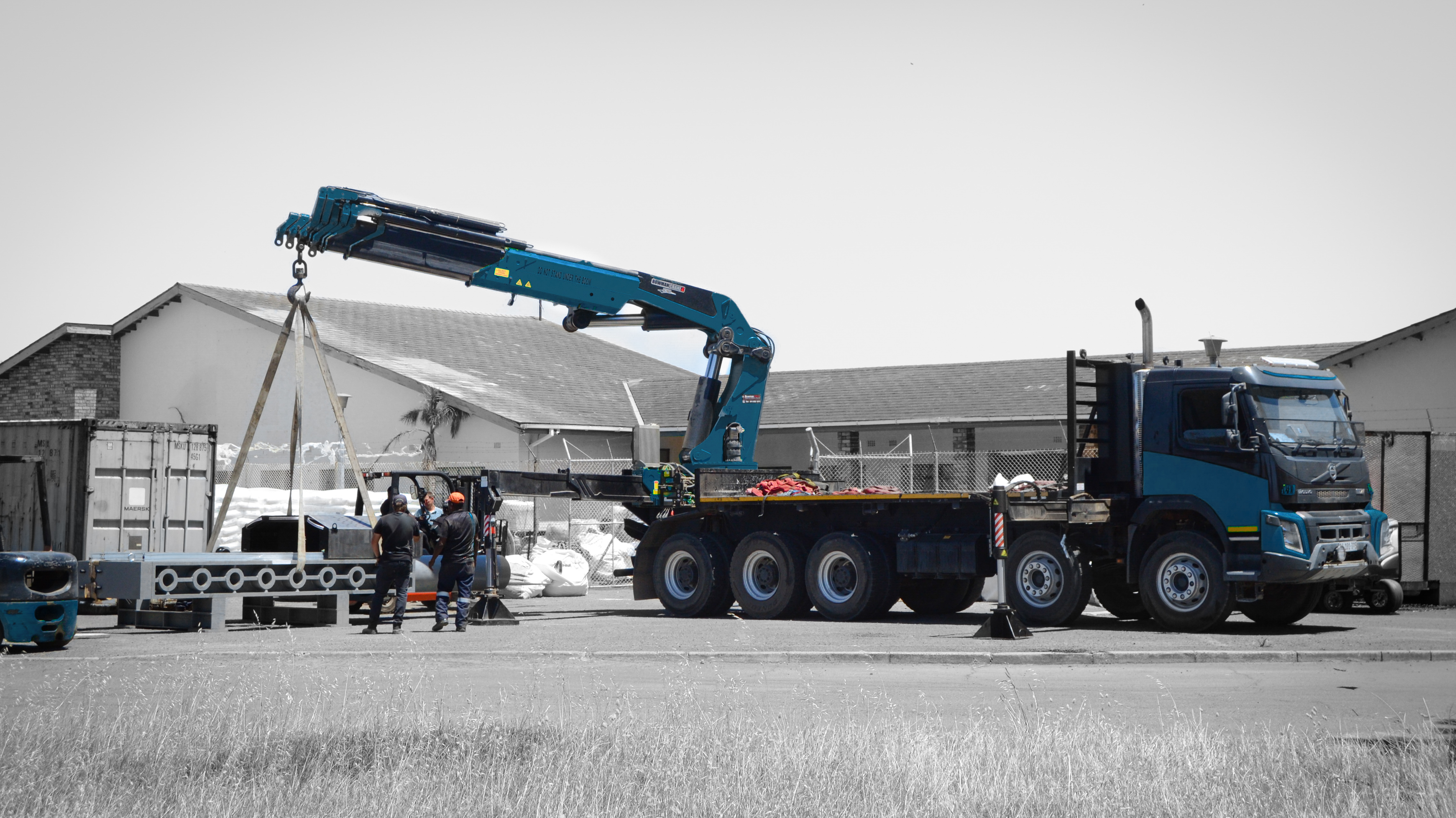 Mobile crane at golden hour on South African industrial site
